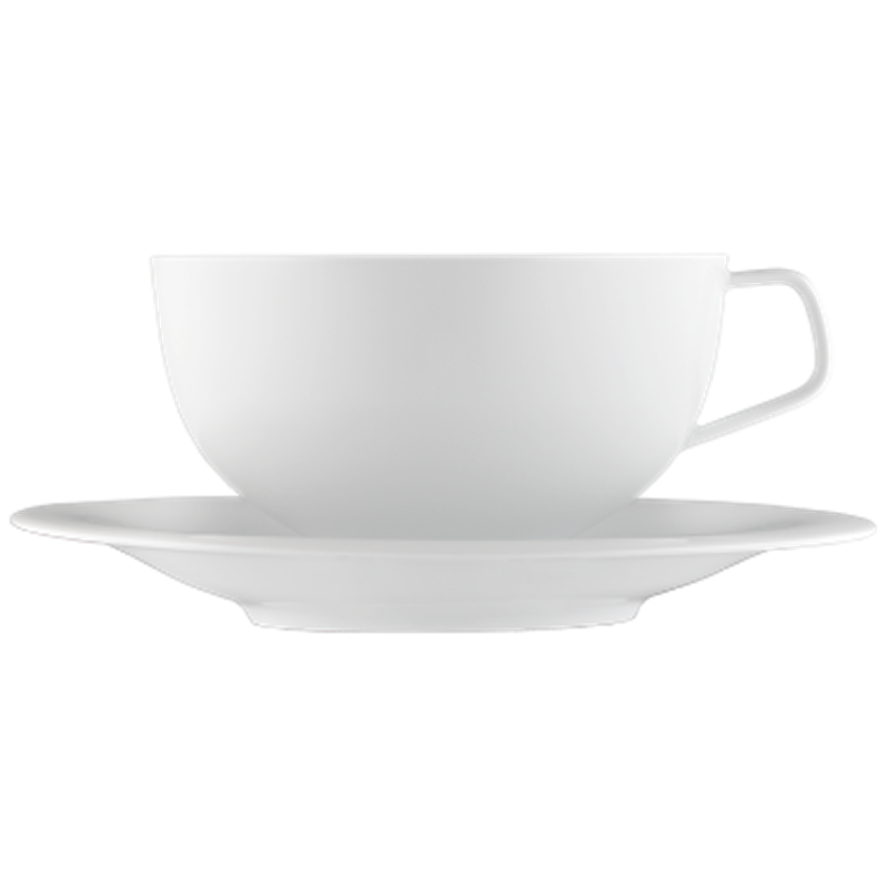 Weiße Tasse mit goldnem Punkt steht auf passender Untertasse, seitlich betrachtet. Fürstenberg Porzellan.