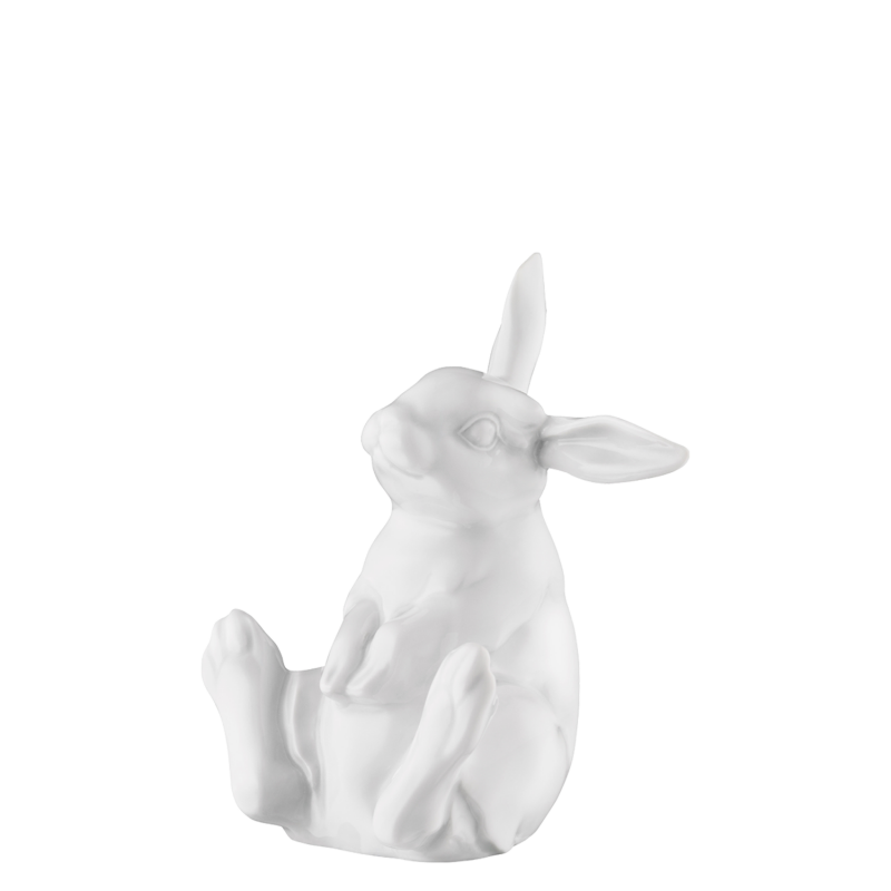 img1_pl190212weiss_hase_2022_paul Weiße Porzellanfigur eines sitzenden Hasen, entspannt mit erhobenen Ohren. Fürstenberg Porzellan.