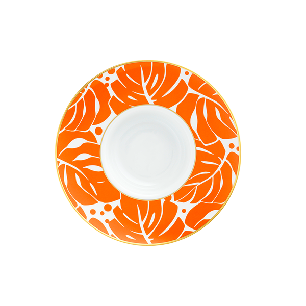 Untertasse mit orange-weißem Blättermuster und kleinem goldenen Rand. Fürstenberg Porzellan.