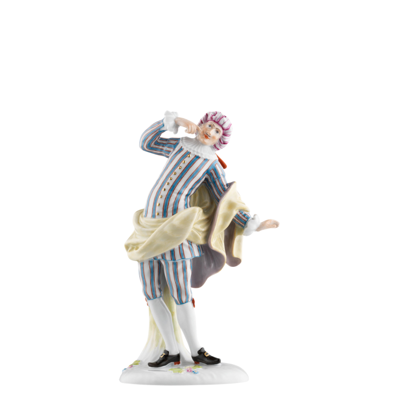 img1_pl_293__farb_mezzetin Porzellanfigur harlekinesk posierend mit gestreiftem Anzug und gelbem Schal. Fürstenberg Porzellan.