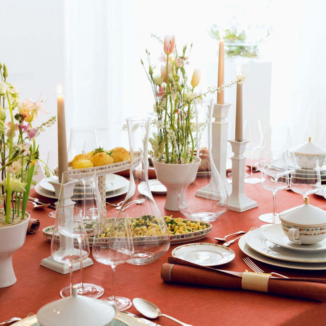 Table culture - laid table with orange tablecloth