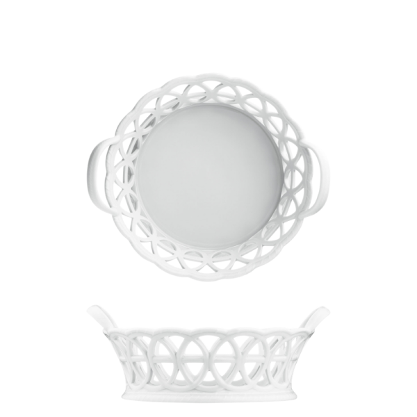 Weiße durchbrochene Porzellanschale mit seitlichen Griffen, stilvoll platziert. Fürstenberg Porzellan.